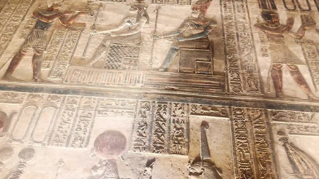 Beautiful bas-reliefs and ancient hieroglyphs from the Dendera Temple Complex, Qena, Egypt.