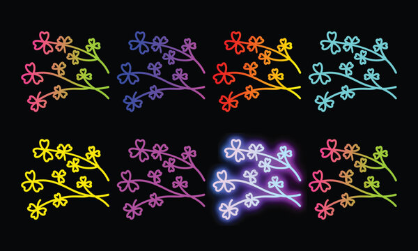 Neon clover sprigs icon set with various color gradients on black background for design.