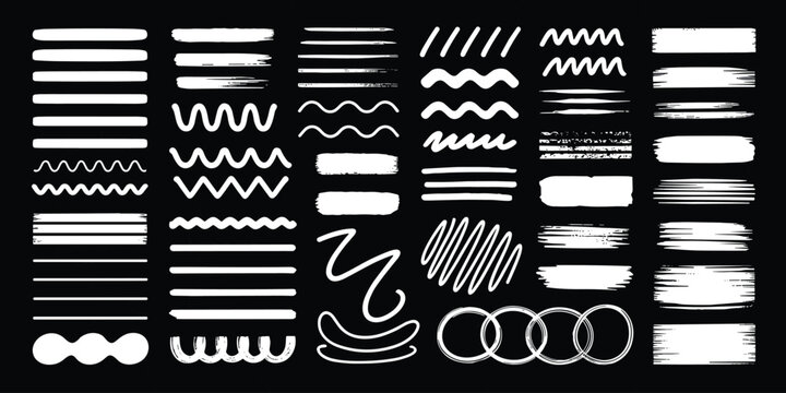 Collection of white hand drawn brush strokes, lines, and shapes on black background