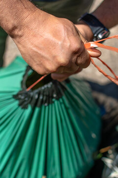 POV vertical close up closing garden waste bag