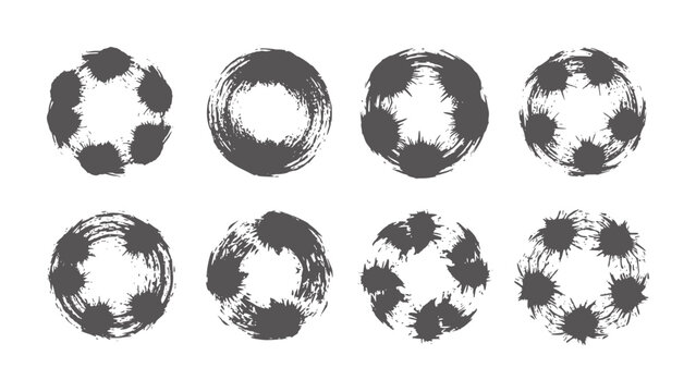 Eight abstract dark grey brush stroke circles resembling soccer balls