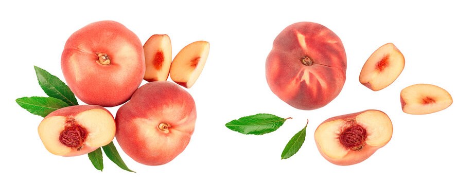 Ripe chinese flat peach fruit and half with leaf isolated on white background. Top view. Flat lay