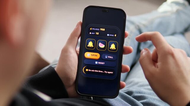 Hit the jackpot. High-quality 4K footage of a user winning credits on a mobile slot game. Perfect for gambling app promos, online casino ads, and digital entertainment content. Showcase the thrill of