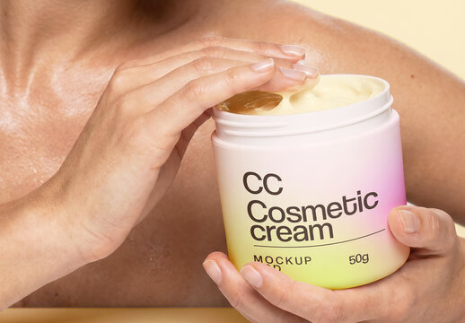 Cosmetic Cream Jar Mockup Held by Model