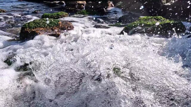 Freshwater gushing out of an old pipe and discharging into the Black Sea