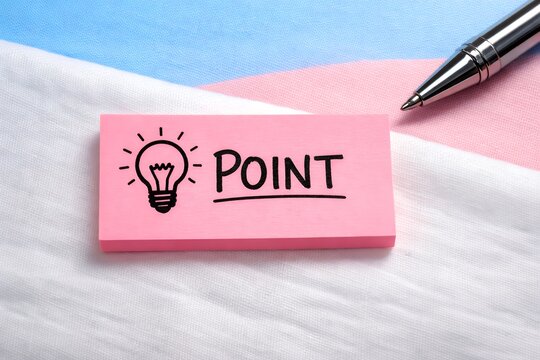 Pink sticky note with 'POINT' and lightbulb drawing on transgender fla