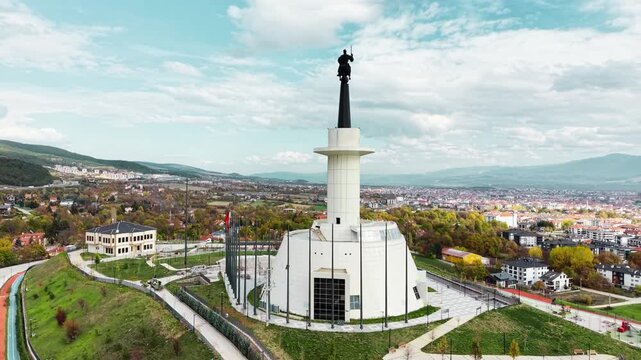Scenic view of the Millennium Cross in Skopje, North Macedonia, standing prominently on Mount Vodno with breathtaking panoramic landscapes. The iconic monument is surrounded by beautiful mountain 