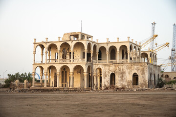 Fototapeta premium War damaged ruins of the Banco d'Italia building in the Old Town of Massawa, Eritrea
