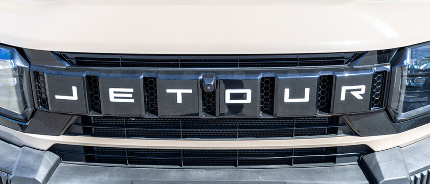 Front part of Jetour T2 vehicle with logo. Chinese automobile manufacturer