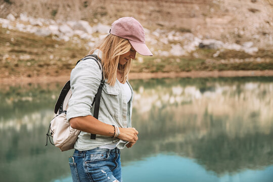 Female Backpacker Exploring Mountain Landscape
