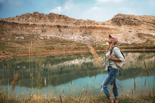 Female Backpacker Exploring Mountain Landscape