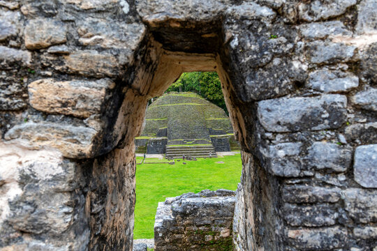 View over the Mayan Water Lily Temple (Structure 5B) under a mansard roof, Caracol, Belize.