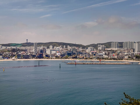 Ulsan, South Korea, April 18, 2026: Ilsan Beach View with Apartments, Village, Houses, Homes, Mountain Cityscape 울산 일산 해수욕장 도시 전경
