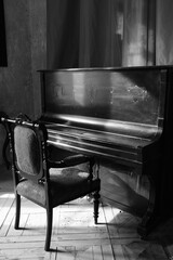 Old Upright Piano in Dark Atmospheric Room © JadvigaAdomaitite