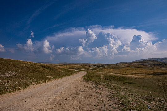 Dirt Road Through the Scenic Landscape of Plužine, Bosnia and Herzegovina
