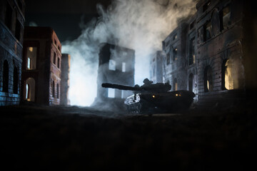 War Concept. Military silhouettes fighting scene on war fog sky background, World War Soldiers Silhouette Below Cloudy Skyline At night. Battle in ruined city. © zef art