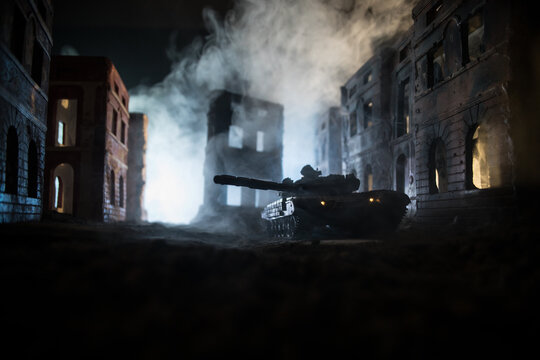 War Concept. Military silhouettes fighting scene on war fog sky background, World War Soldiers Silhouette Below Cloudy Skyline At night. Battle in ruined city.