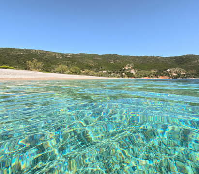 Agios Dimitrios, white pebbled beach, located on the eastern side of Alonnisos, Greece