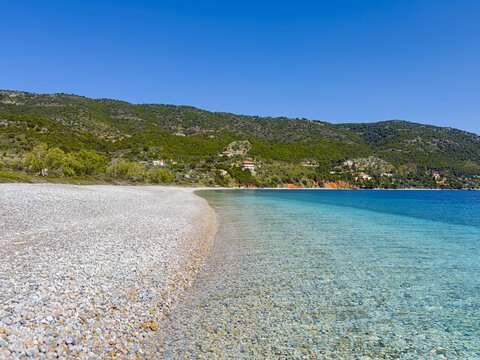 Agios Dimitrios, white pebbled beach, located on the eastern side of Alonnisos, Greece