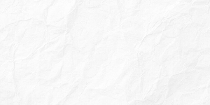 White crumpled paper texture background with subtle shadows and creases. Textured surface of white crumpled and wrinkled paper.
