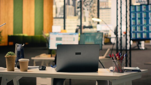 Empty business office, work environment with supplies, modern furniture and natural light, Executive office, comfortable desk setup, stationery and laptop, corporate open plan.