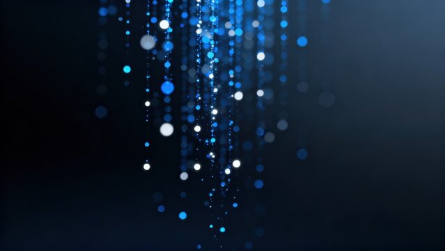Abstract blue light particles on dark background