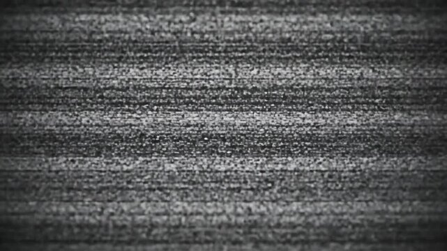 Abstract static noise pattern on a dark background with subtle vertical lines
