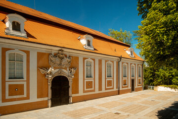 Picturesque Baroque Manor In Czech Republic Featuring Ornate Design And Lush Foliage © Val MAK