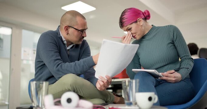 Business team discusses plans at office during daytime with focus on strategy and collaboration