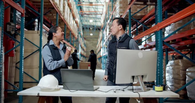 Applause, computer and high five with people in warehouse for distribution management. Planning, success and technology with courier team in storage depot together for logistics goal or target