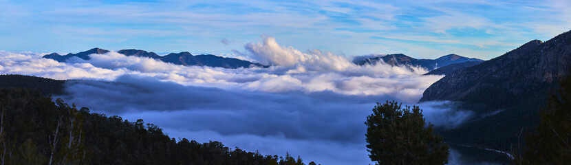 Fototapeta premium Panorama Cloud Layer Over Mt Charleston Forest and Mountain Landscape Nevada