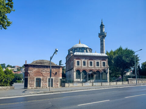 Istanbul, Turkey - July 20, 2024: City views. Seb Sefa Hatun Mosque along Ataturk Blvd with its sole minaret under blue sky