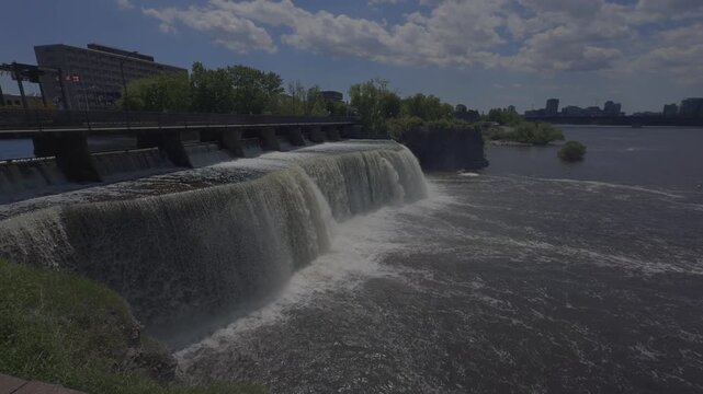 Waterfalls falling into a river