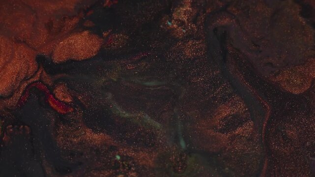 Dark luxury abstract fluid background with flowing gold and red paint texture, macro paint movement