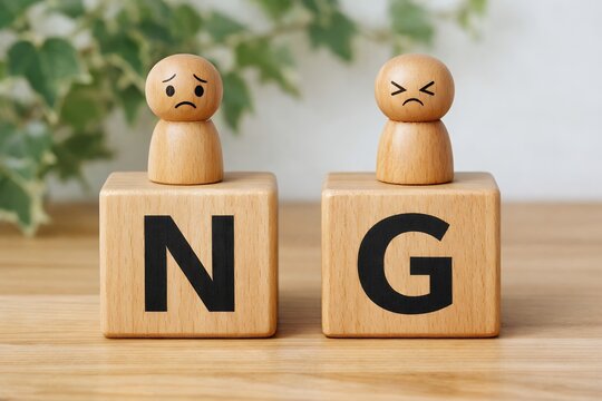 Displeased wooden figures on NG blocks