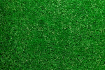Fototapeta premium Bright green synthetic fiber texture background close up macro shot.
