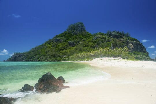 Beautiful white sand beach on Monuriki or Cast away island, Mamanuca islands, Fiji