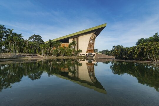 National Parliament reflecting in the water, Port Moresby, Papua New Guinea