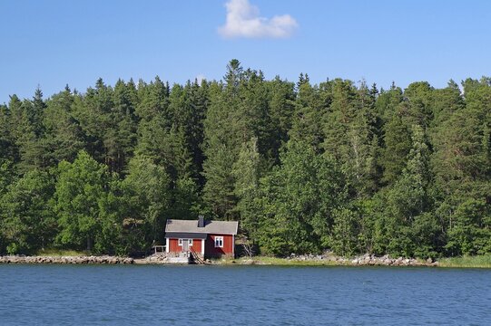Small red cottage on the shore of the Baltic Sea, forest, romantic, autonomous region, Baltic Sea, Aland Islands, Finland
