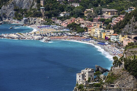 The village of Monterosso al Mare, view from the hiking trail Via dellAmore, in front of it the Torre Aurora Mare, Monterosso al Mare, Cinque Terre, Ligurian Coast, Liguria, Italy