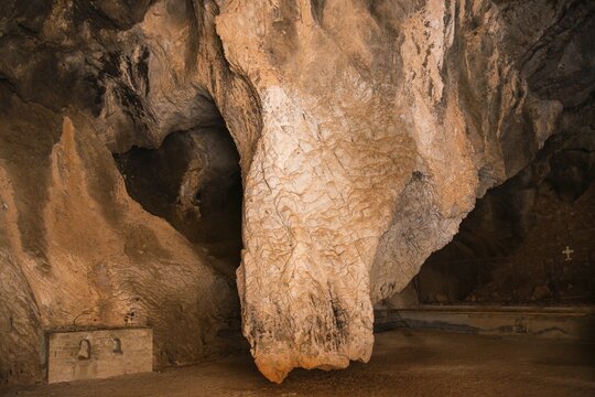 Dramatic limestone formation in a cave with strong textures, Church of Mary the Fountain of Life, Zoodochos Pigi, Rock Church, Kefalari, Argolis, Peloponnese, Greece