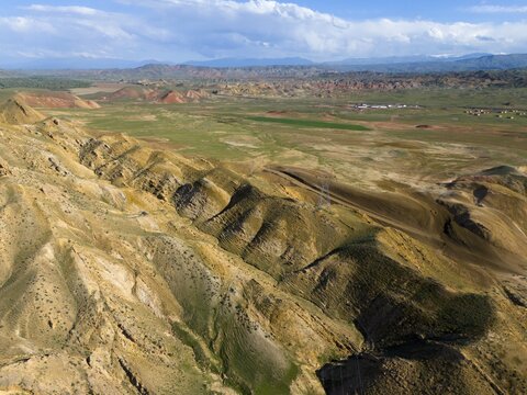 Wide, mountainous landscape with barren hills under a cloudy sky, aerial view, mountains at D70 and D80, Tuzluca, Igdir province, Iğdır, Eastern Anatolia, Anatolia, Turkey