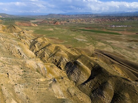 Hilly landscape with striking rock formations, green valleys and wide, partly cloudy sky, aerial view, aerial view, mountains on D70 and D80, Tuzluca, Igdir province, Iğdır, Eastern Anatolia, Anatolia, Turkey