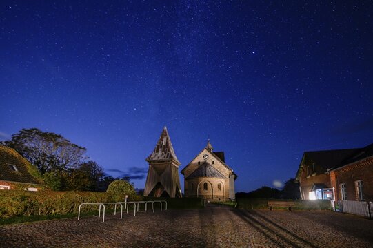 St Salvator's Old Church at night, starry sky, Klostermitteldeich, Pellworm Island, Schleswig-Holstein Wadden Sea National Park, North Frisia, Germany