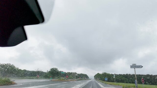 Point of View Driving on Rainy Highway in Paris France