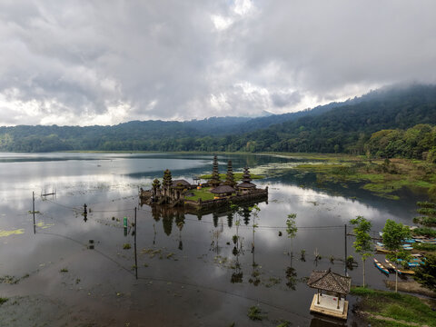Pura Ulun Danu Tamblingan Hindu Temple on Water with Reflections and Mountain Rainforest, Bali, Indonesia