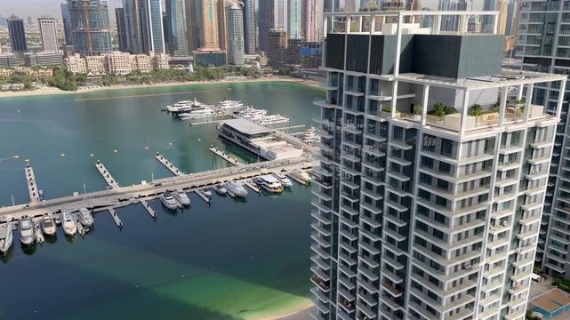 Skyline perspective of Palm Jumeirah captured from Emaar Beachfront in DUbai