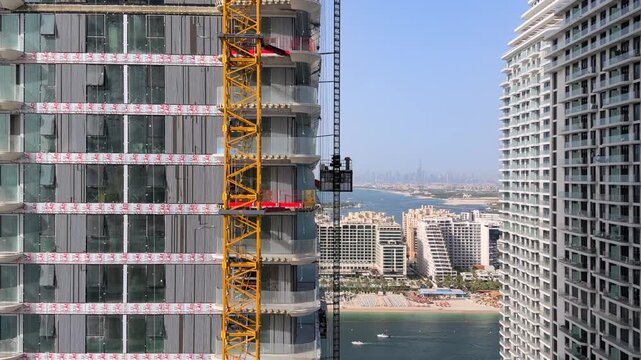 An aerial cityscape of Palm Jumeirah seen from Emaar Beachfront in Dubai.