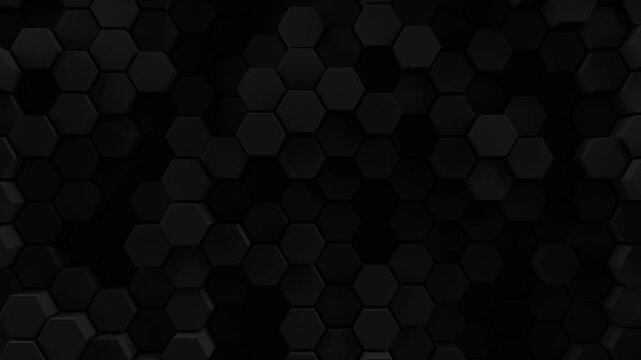 Black honeycomb background of patterned hexagons. 3d rendered hex shapes moving in a random loop creating a visual of a sleek dark shadowy motion for futuristic scientific or technical backgrounds.