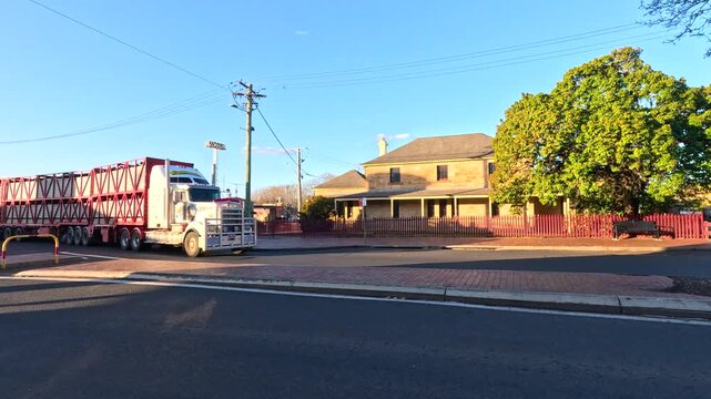 Livestock Road Train Driving Through Rural Stanthorpe Town Center